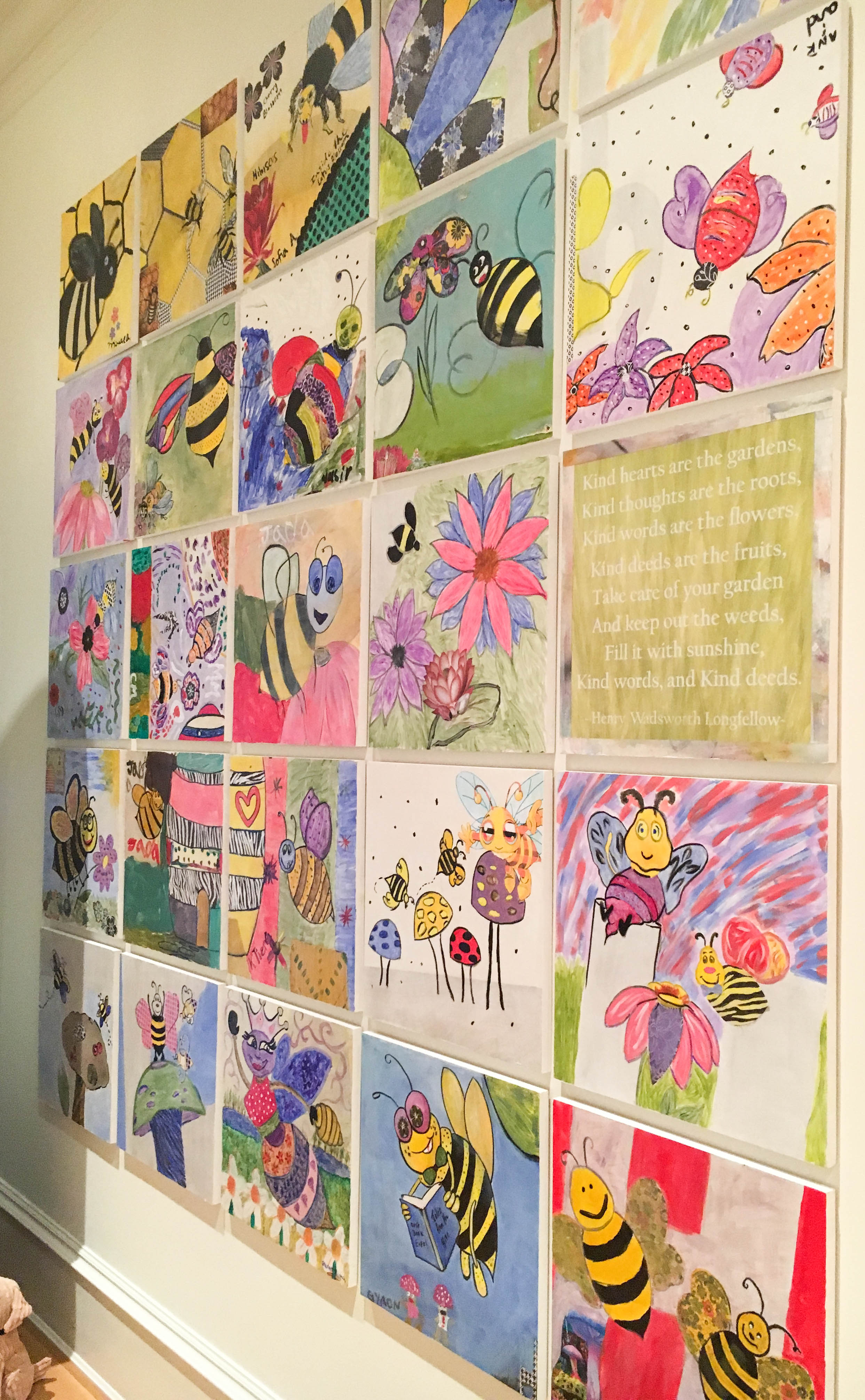 A beautiful and emotional gallery wall installation featuring paintings with a bee theme by patients, caregivers, staff, and volunteers of Children’s National Health System.