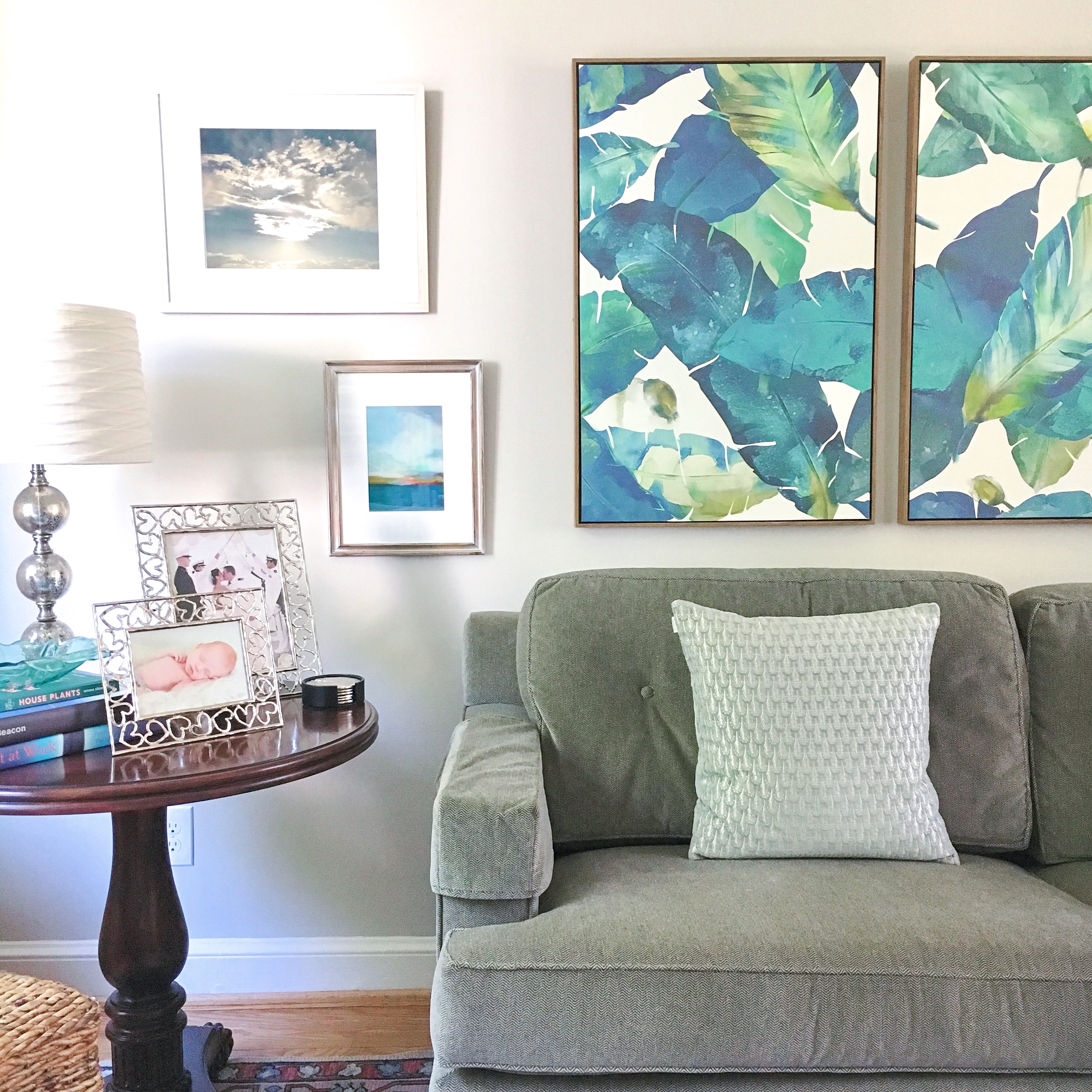 The lively palm leaf print in this framed wall canvas set from Target features beautiful, bold blue and green hues.